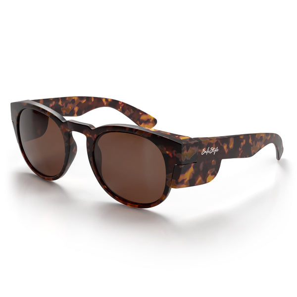 Cruisers safety glasses with matte brown tort frame and brown polarised lens at an angle