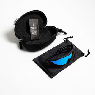 Matte black Phantoms safety glasses with blue lenses and reflectors, front view