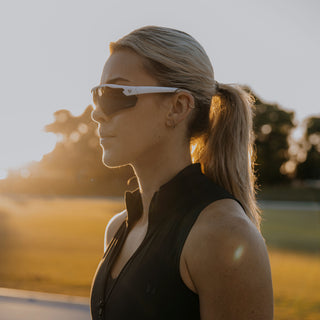Phantoms Matte White safety glasses on a person, polarised lenses, side angle