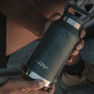 Fusions Glasses and Big Juicy 1L Water Bottle bundle, front view, showcasing safety glasses and insulated bottle